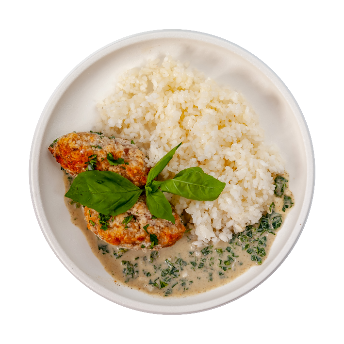 Рыбные котлеты в сливочном соусе со шпинатом и рисом